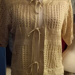 New,with tag, soft beige crochet 3 ties-front short sleeve cardigan size medium.